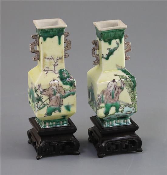 A pair of Chinese miniature enamelled biscuit (susancai) vases, 18th century, H. 8.3cm, wood stands, in a fitted hongmu case